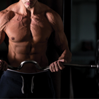 muscular-man-lifting-barbell-gym-HYPERTROPHY